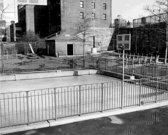 A photo from the 1950s, showing a basketball court where a pool may have been.